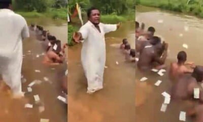 Watch Anambra Prophet Performing Money Ritual For Young Men In A River (Video)