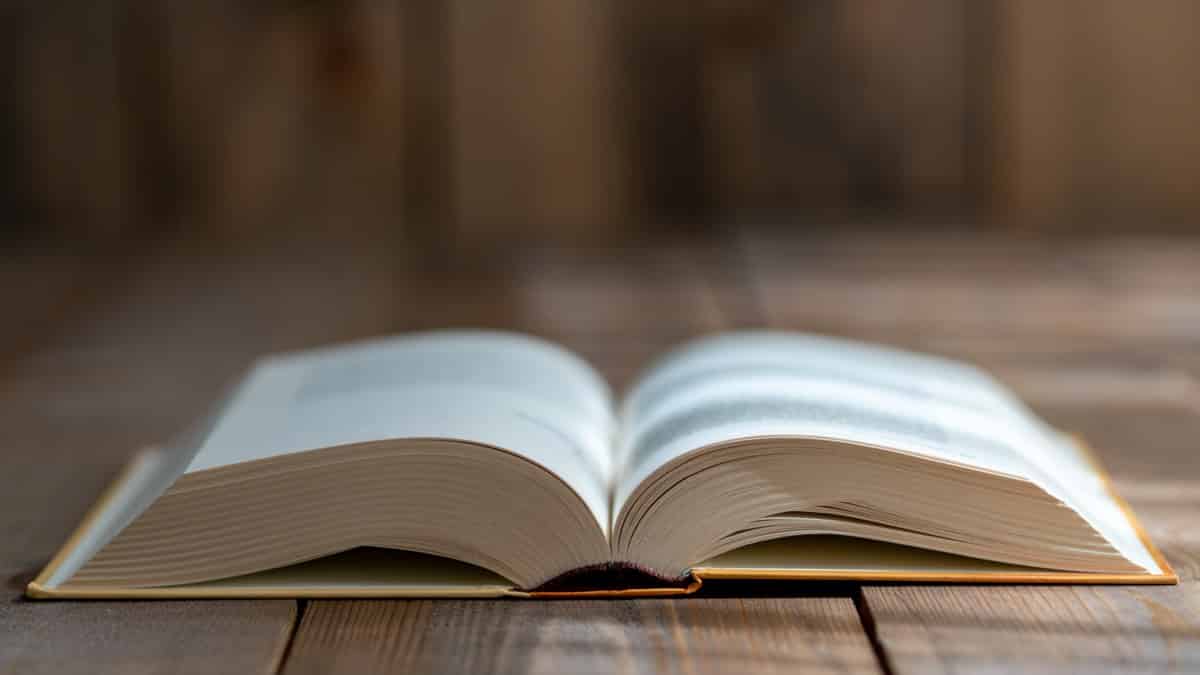 Open dictionary laying on table