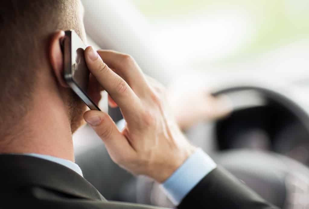 Man holding smartphone to ear
