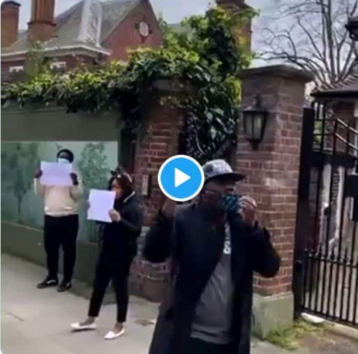 BREAKING: Nigerians Storm Buhari’s Residence In UK To #HarassBuhariOutOfLondon (Video)