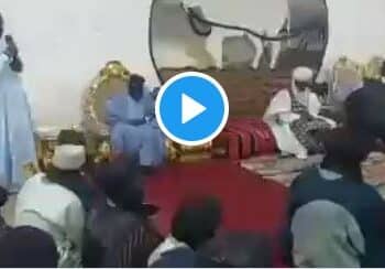 Watch As Aide Wakes Bola Tinubu Up While Sleeping At An Event [Video]