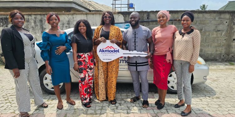Akmodel Groups MD Presents Car Gift To Former General Manager Lagos Branch